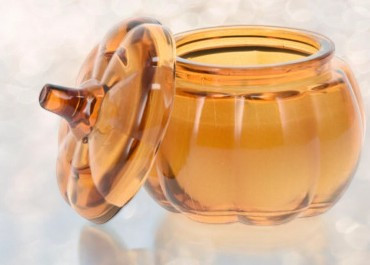 Bougie parfumée citrouille orange en verre patchouli ambre 8 cm